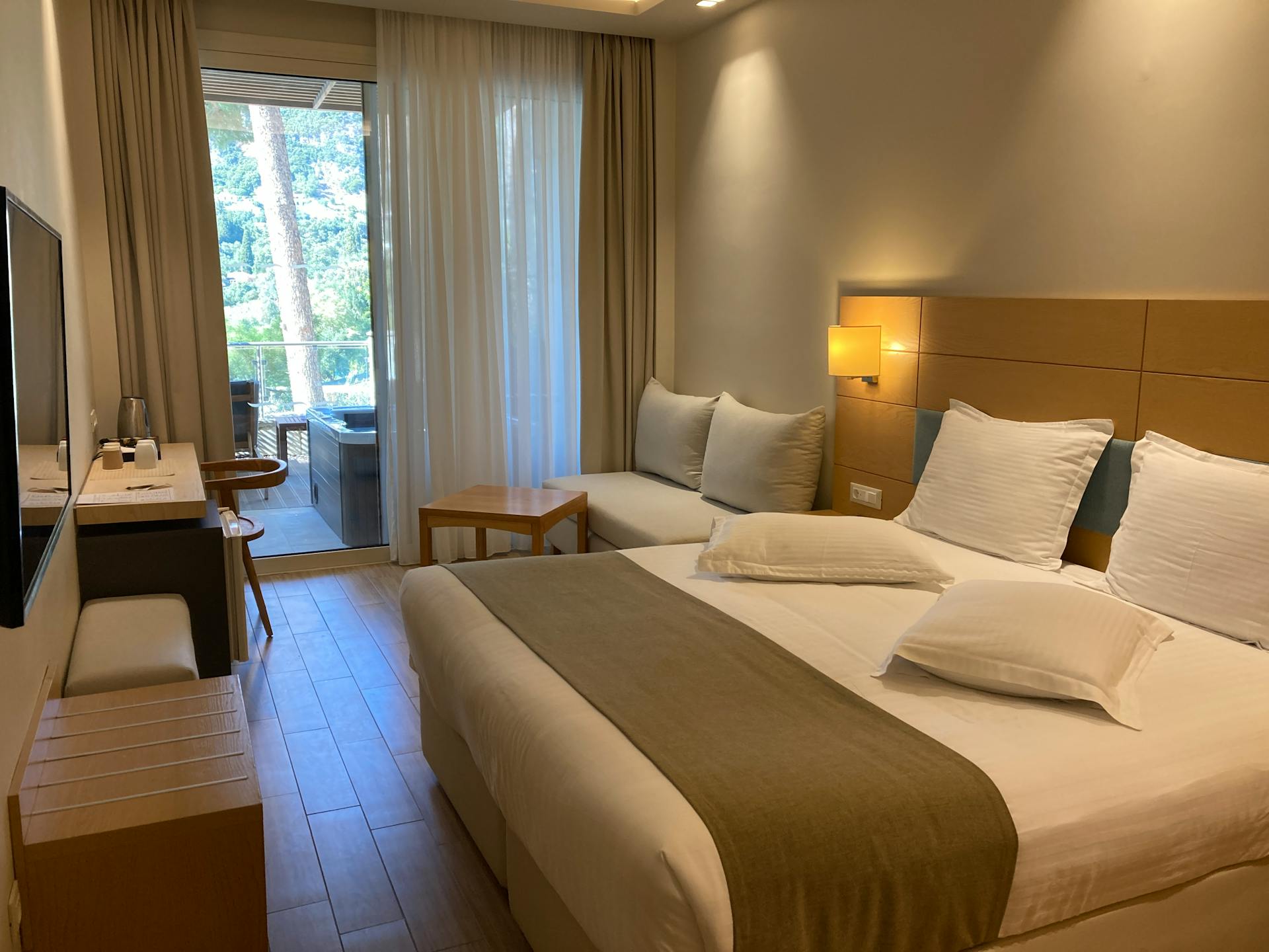 Photo by Travelling Tourist: https://www.pexels.com/photo/elegant-hotel-room-with-balcony-in-corfu-33400871/