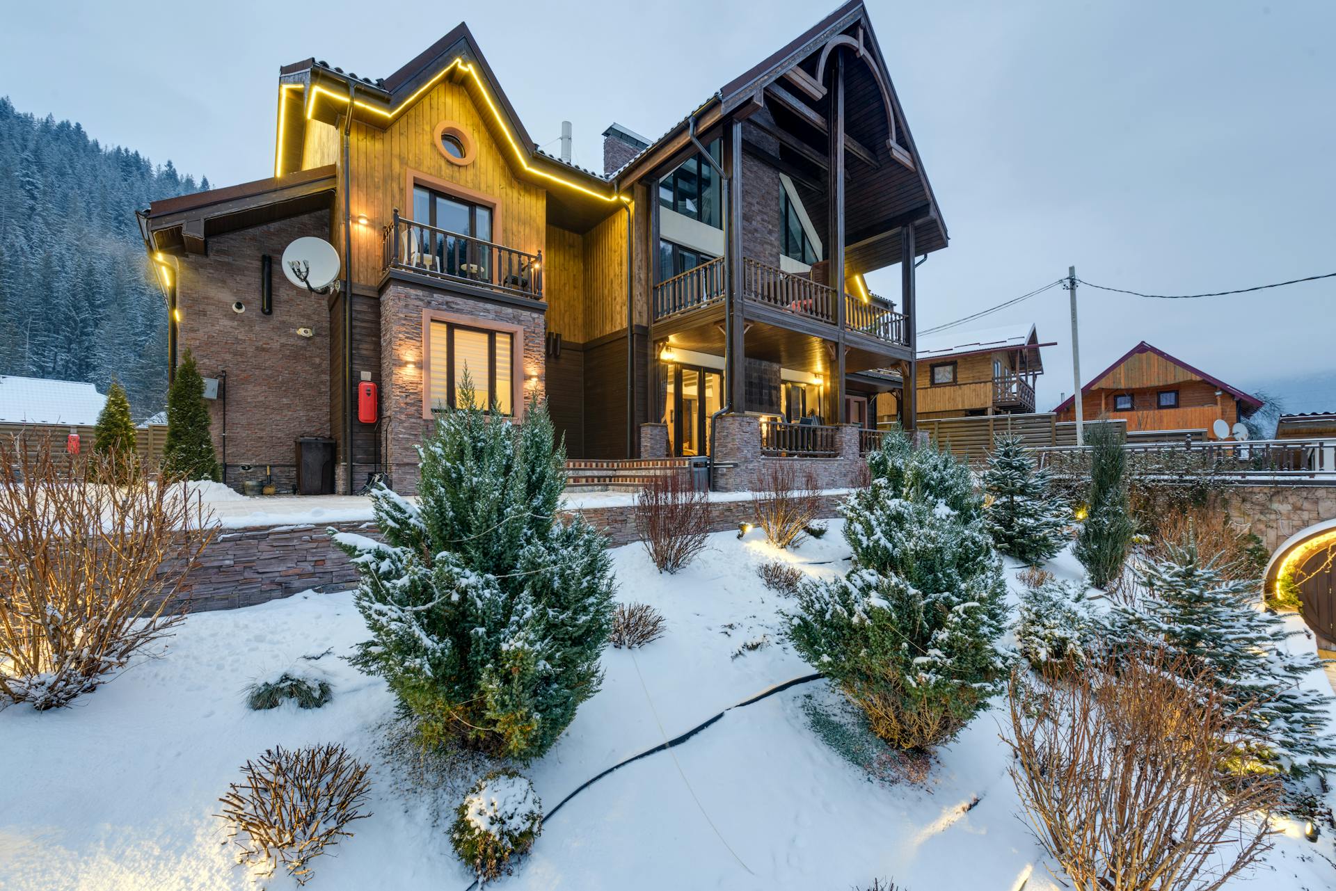 Photo by Max Vakhtbovych: https://www.pexels.com/photo/brick-and-wood-house-near-snow-covered-trees-7746563/