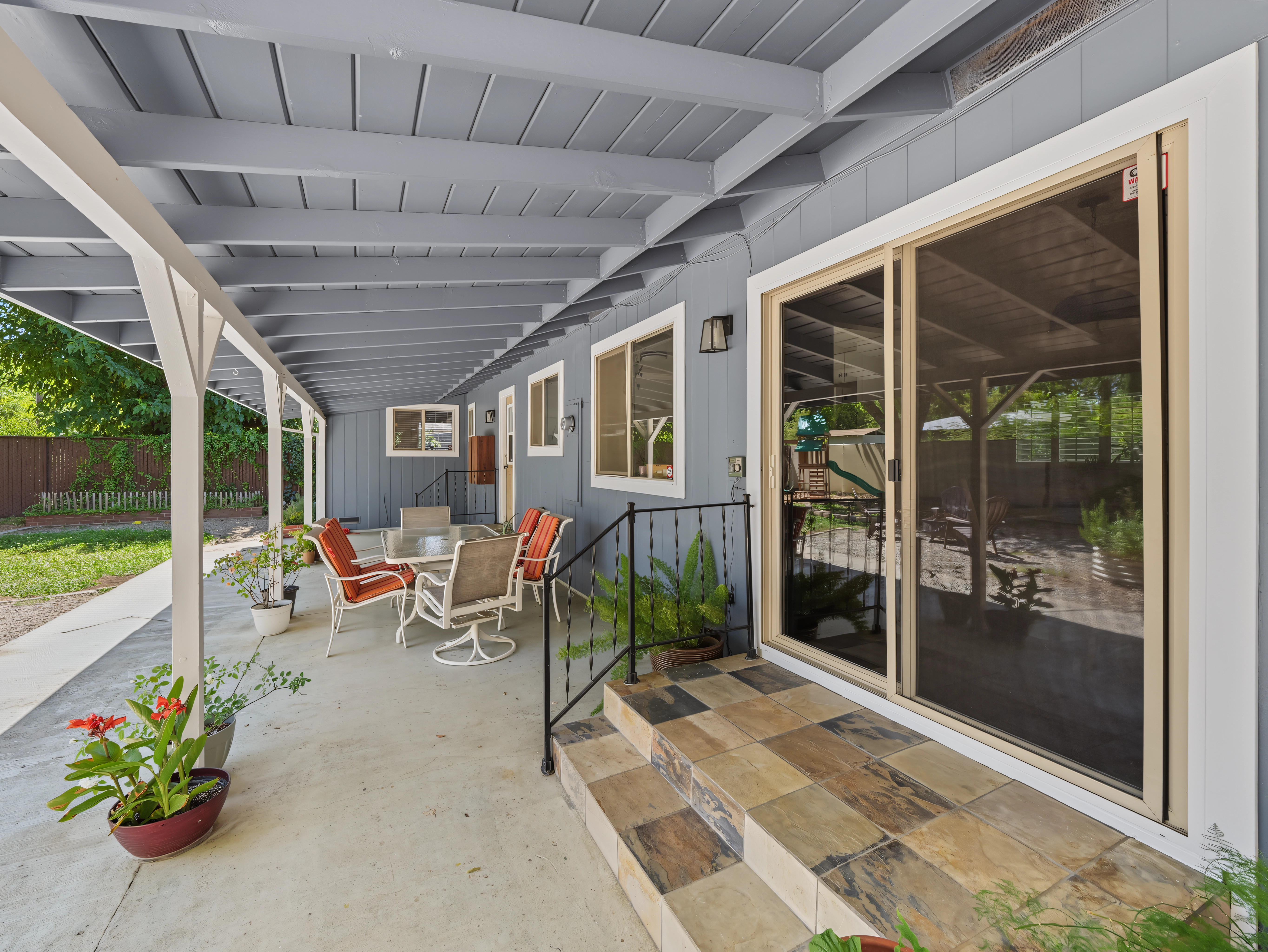 Covered patio and backyard at 715 Christine Avenue in Redding, California