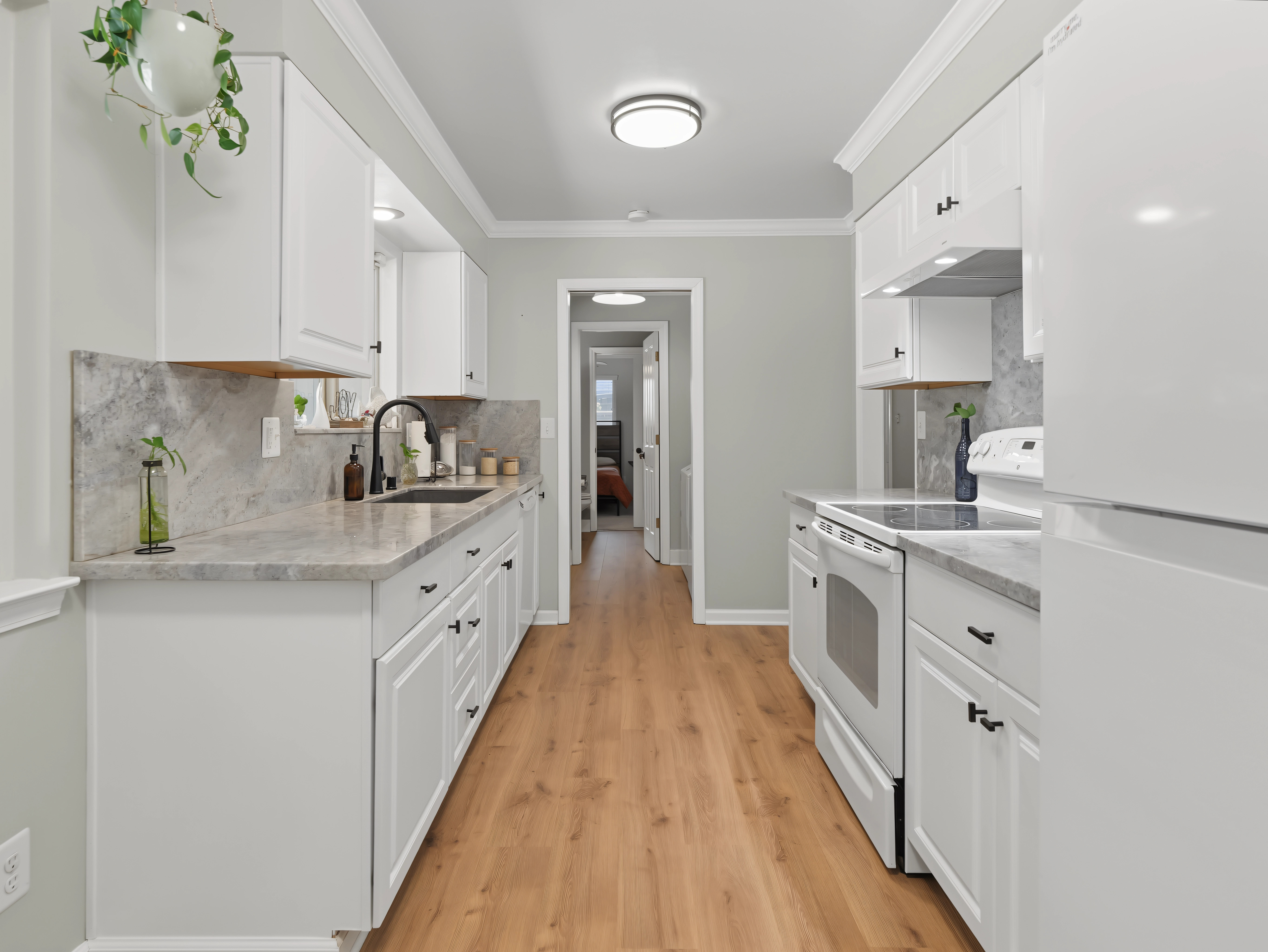 Kitchen at 715 Christine Avenue, Redding CA &mdash; dishwasher, range/oven, instant hot water