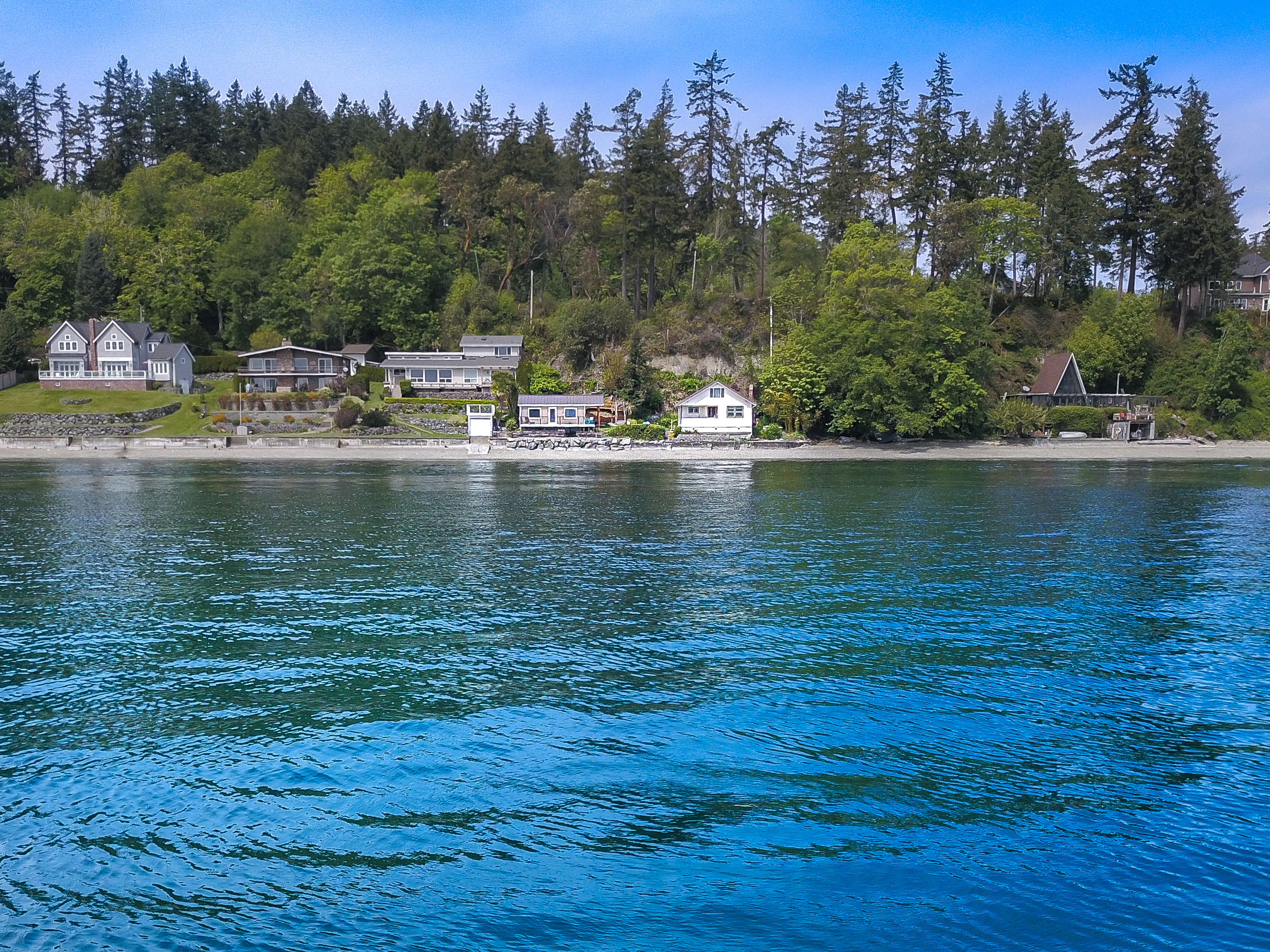 A TALE OF TWO CHARMING WATERFRONT COTTAGES header image.