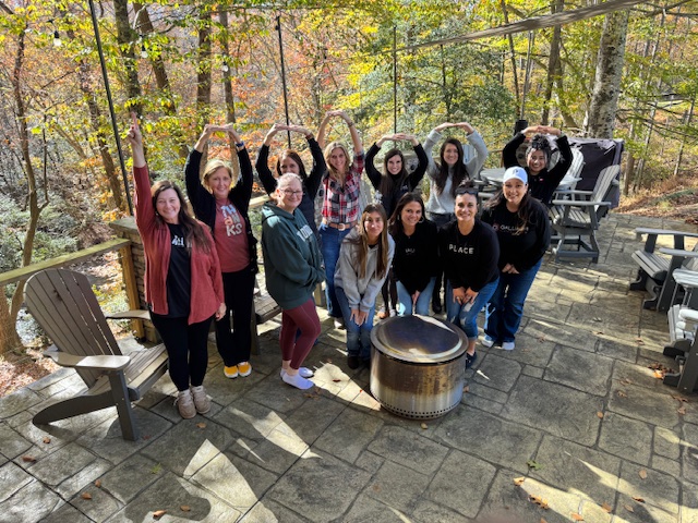 Galliher Home Team real estate agents celebrating together at outdoor team building event in Statesville North Carolina fall 2025