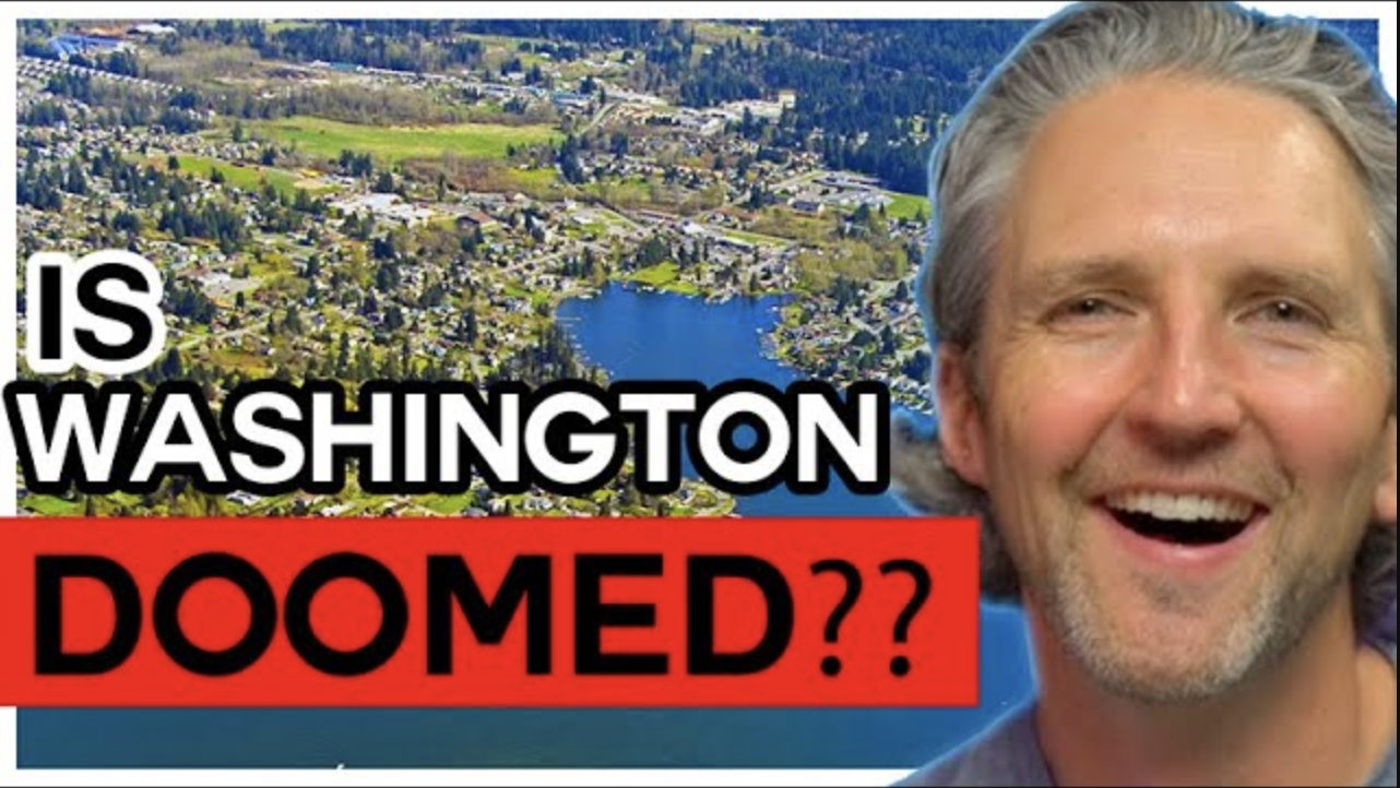 Image of a smiling man in front of an aerial view of Washington neighborhoods and lakes, with bold text reading “Is Washington Doomed??” symbolizing debate over the state’s housing market and economic future.