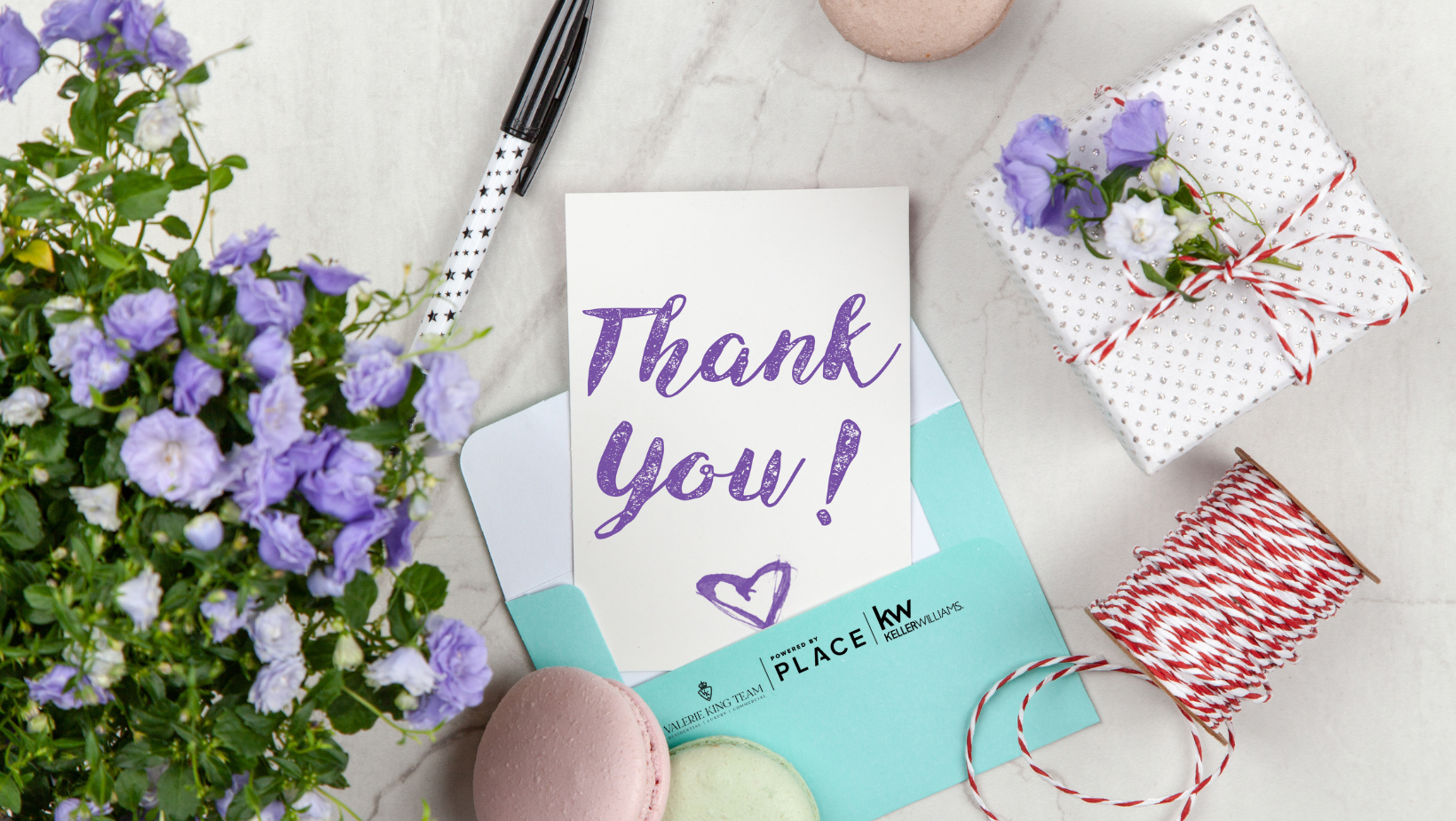 thank you card on a desk, gift box, florals, artsy image