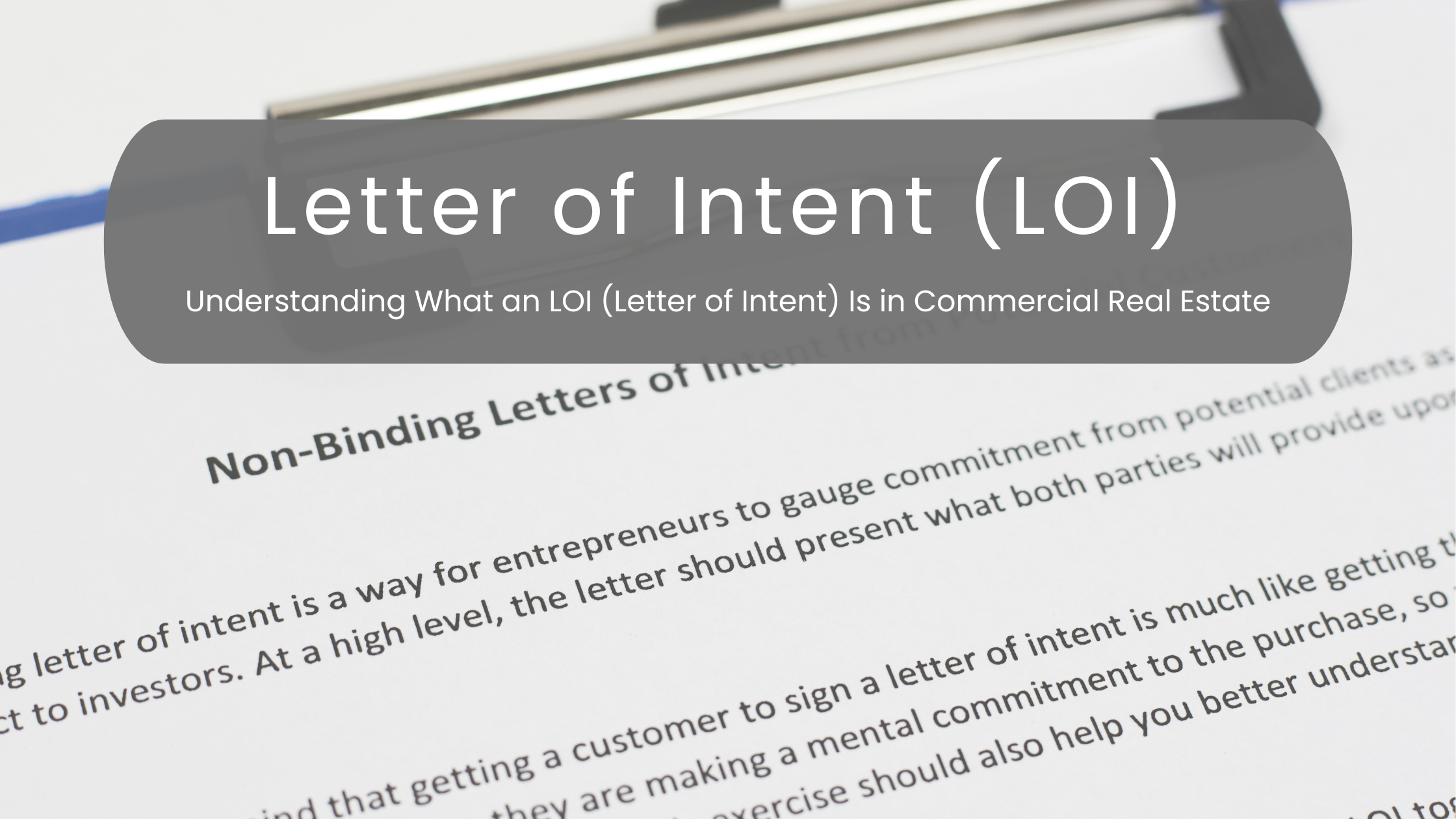 Letter of Intent above a clipboard holding a letter of intent copy