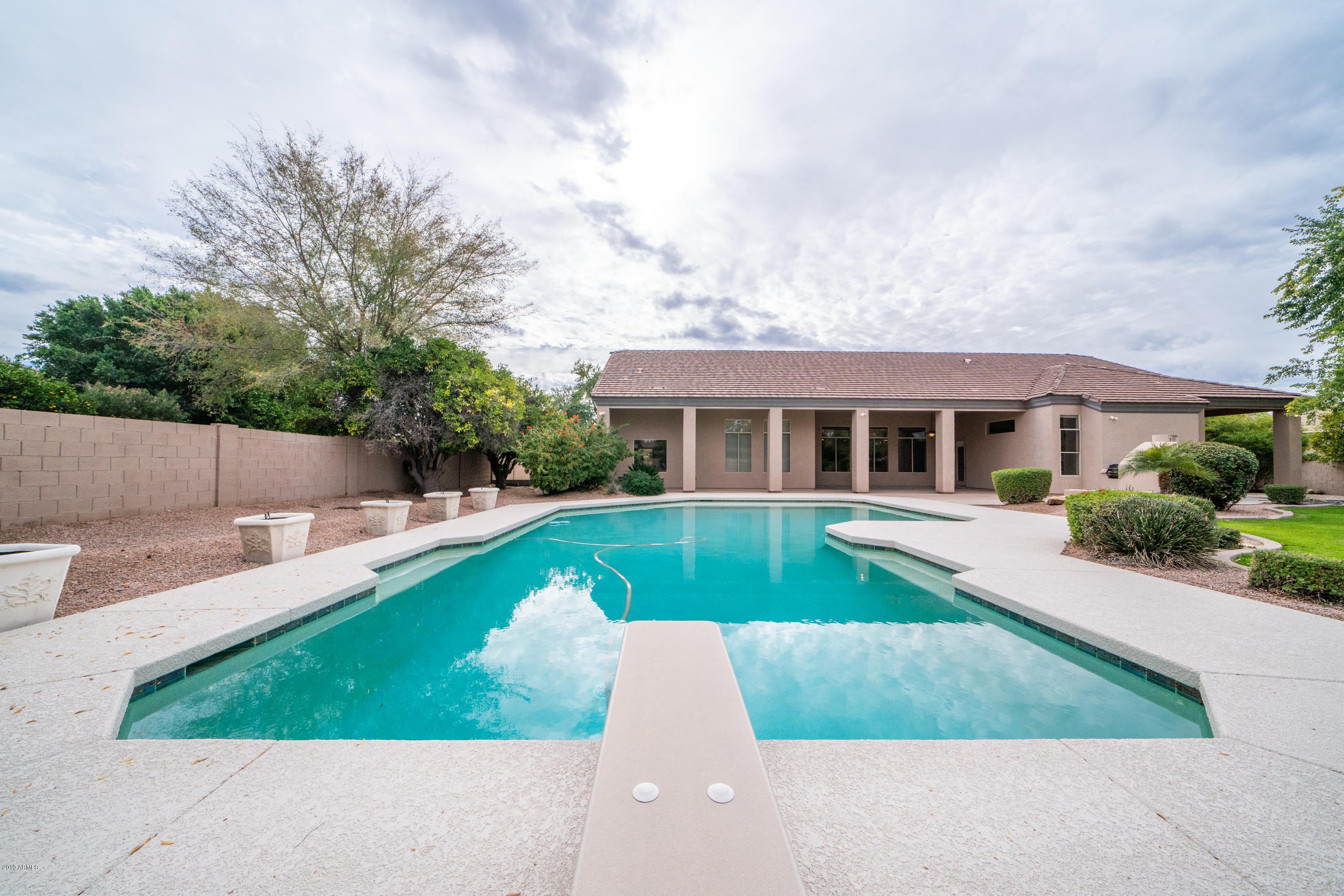 Come Own One Of 16 Homes In A Groves Gated Community- 5 Bed Crossroads Estates Home w/ Game Room & Pool! header image.