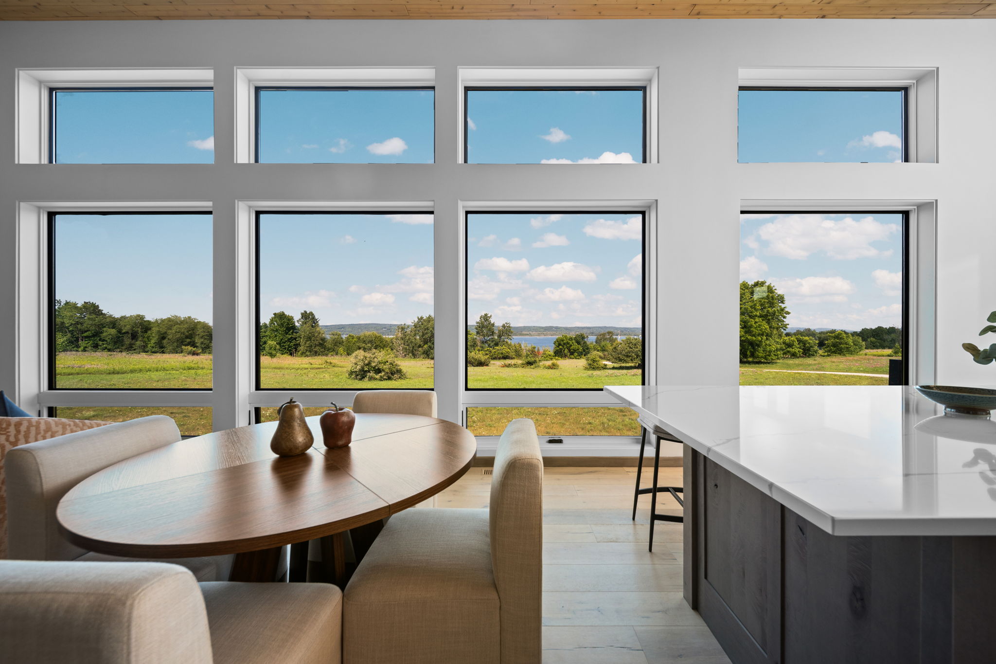 Modern lakefront home interior overlooking Lake Charlevoix