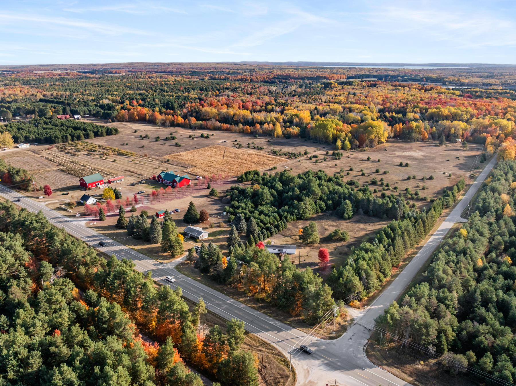 A Slice of Northern Michigan Magic | 4333 & 4391 U.S. 31, Alanson, MI header image.