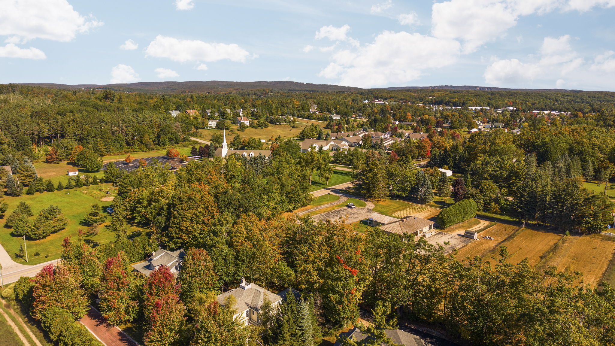 Quiet Harbor Springs with fall leaves