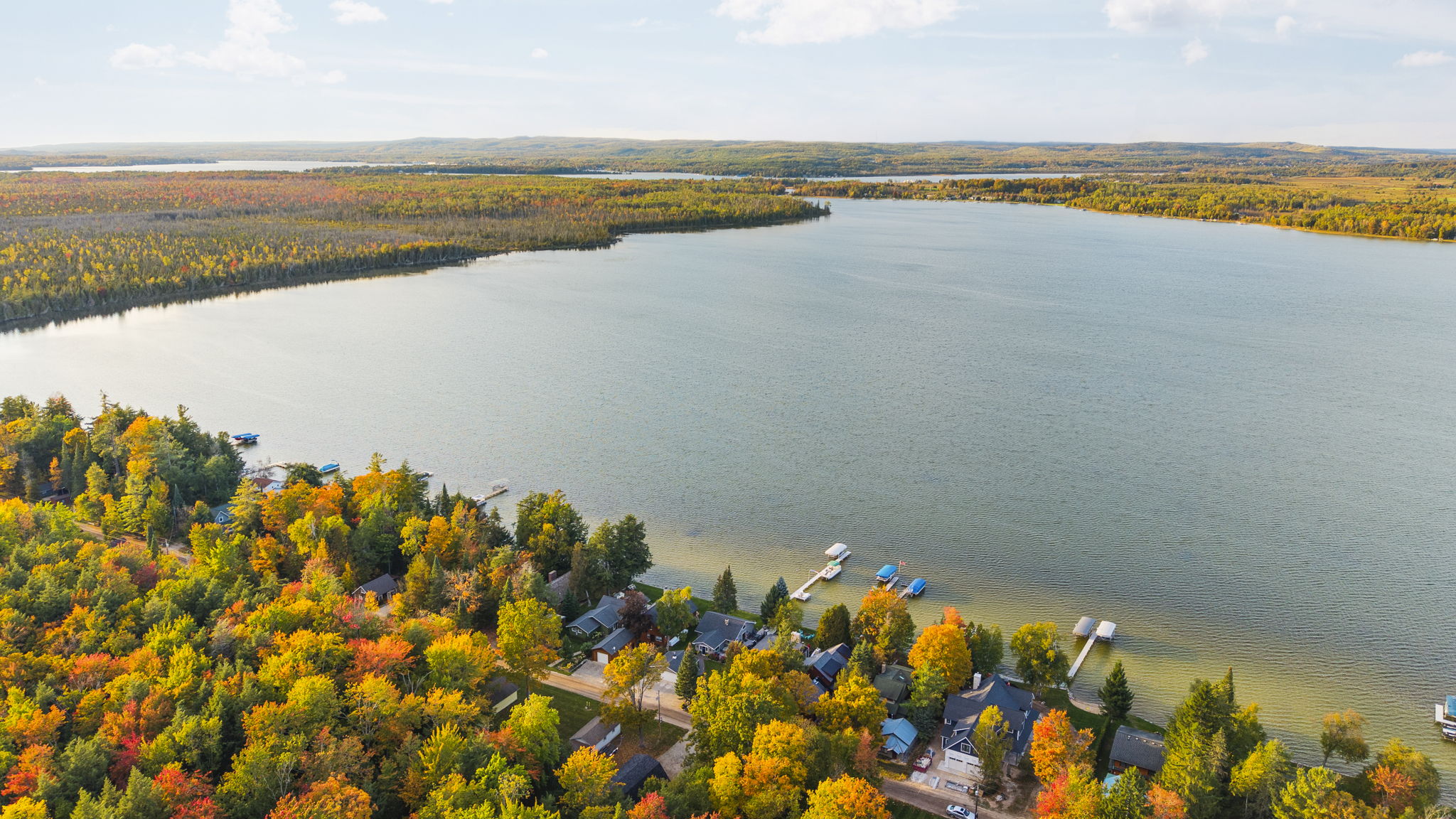 Luxury lakefront home surrounded by pines in Michigan