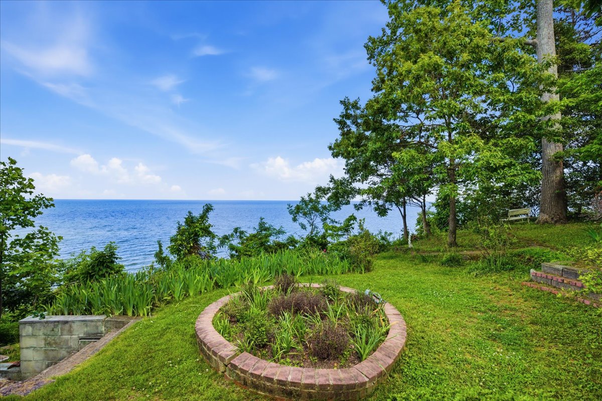 For Sale in Port Republic, Maryland: A Hand-Carved Chesapeake Bay Retreat in Scientists' Cliffs, Calvert County header image.