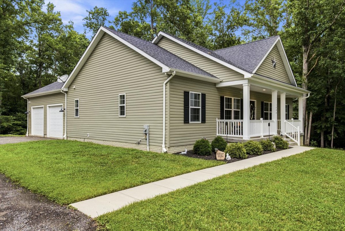 For Sale in Prince Frederick, MD: A Custom Rambler on 3 Private Acres header image.