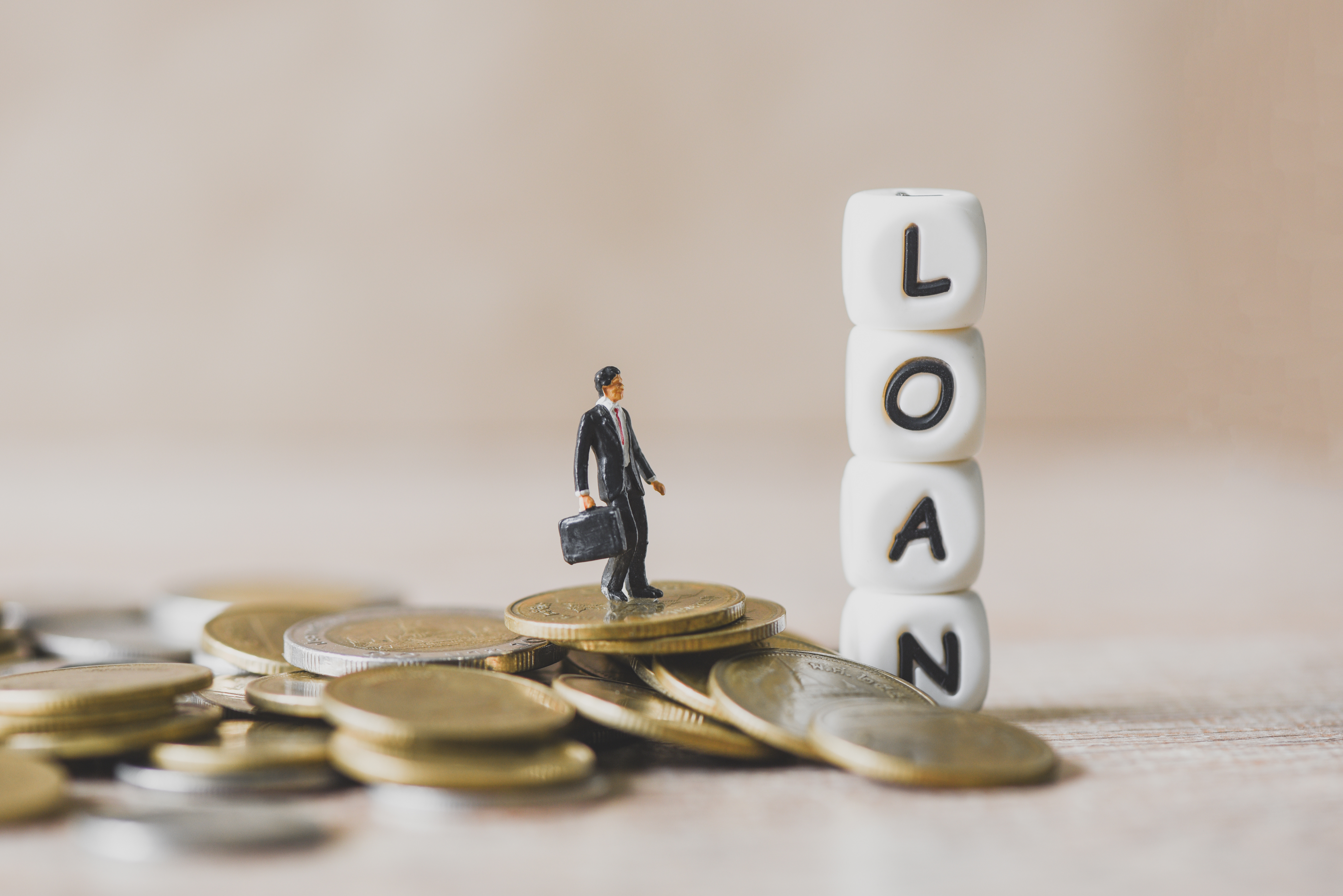 gold change, a man and words that say loan