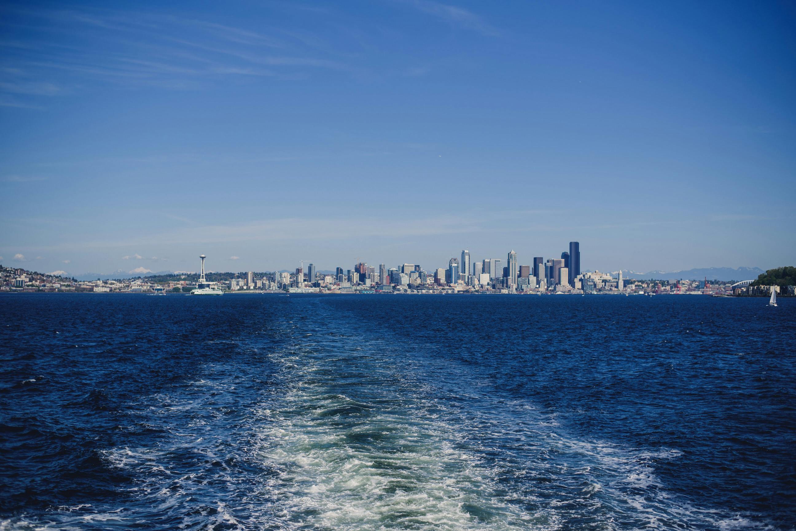 Seattle skyline and waterfront representing seasonal activities around Puget Sound