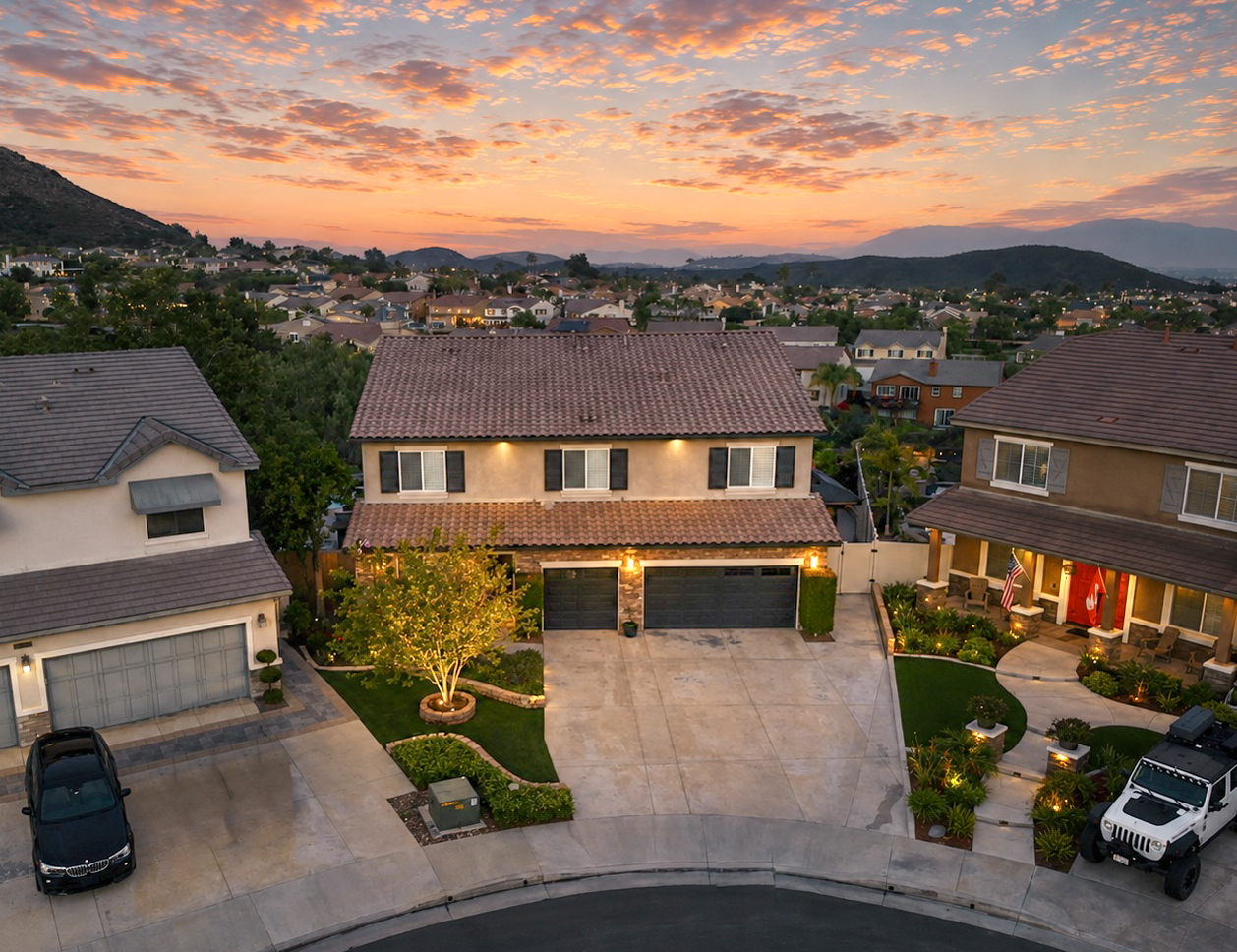 Twilight aerial view of 35944 Wilcox Lane in Murrieta showing an upgraded home at the end of a quiet cul-de-sac with panoramic neighborhood and mountain views.