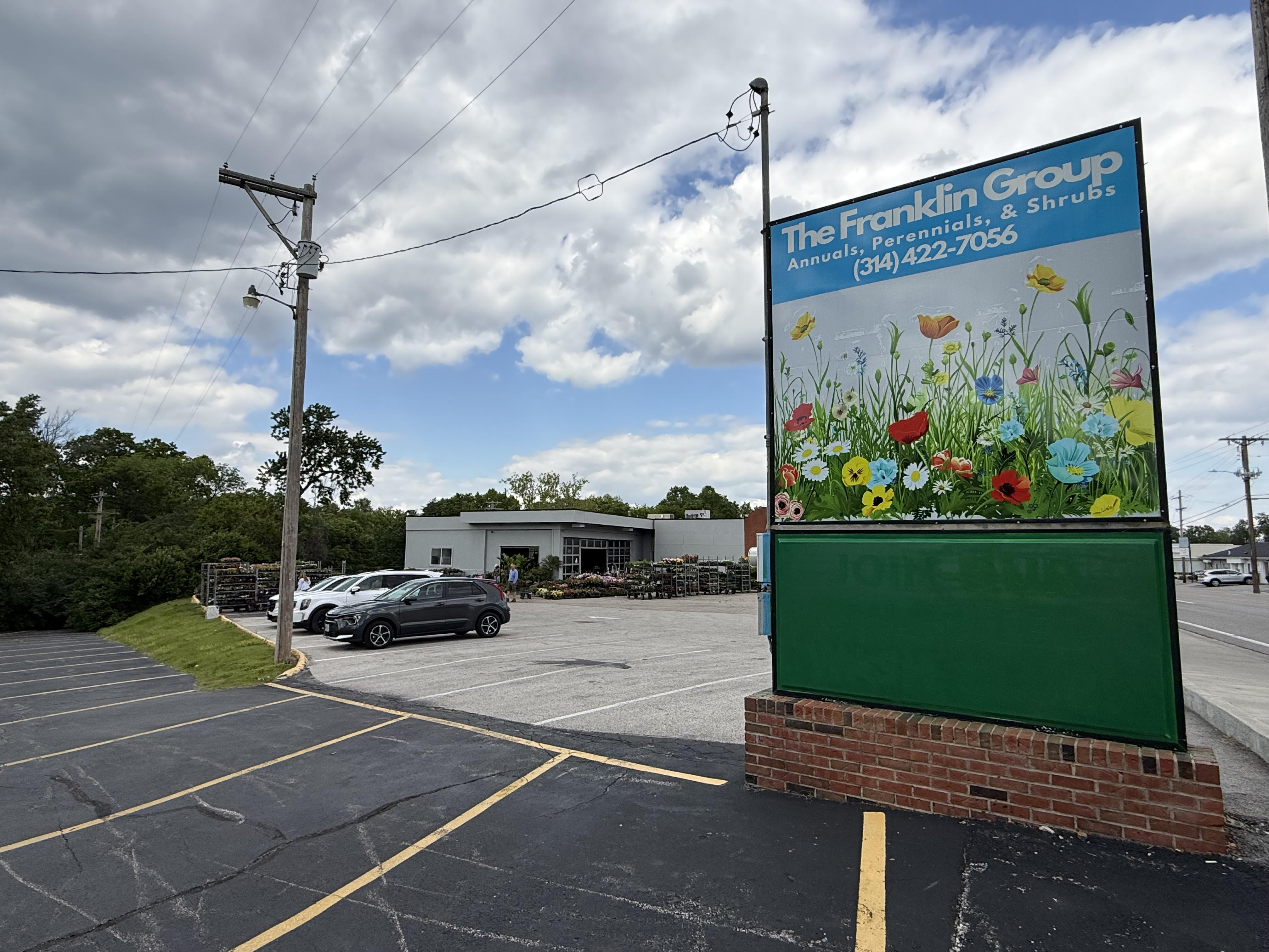 Exterior of The Franklin Group and its sign.