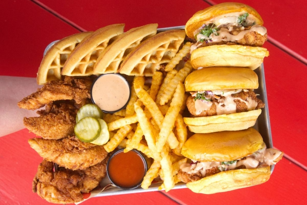 Urban Bird Hot Chicken opens newest location in Cypress By Community Impact header image.