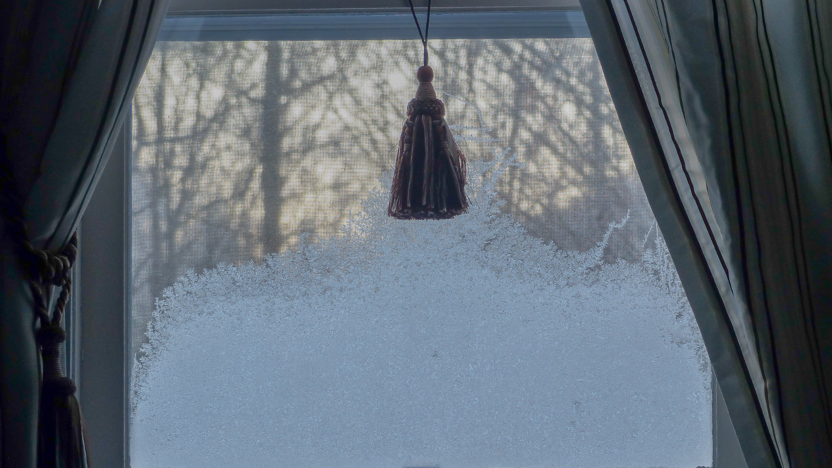 What Causes Ice Inside Windows? By HomeKeepr header image.