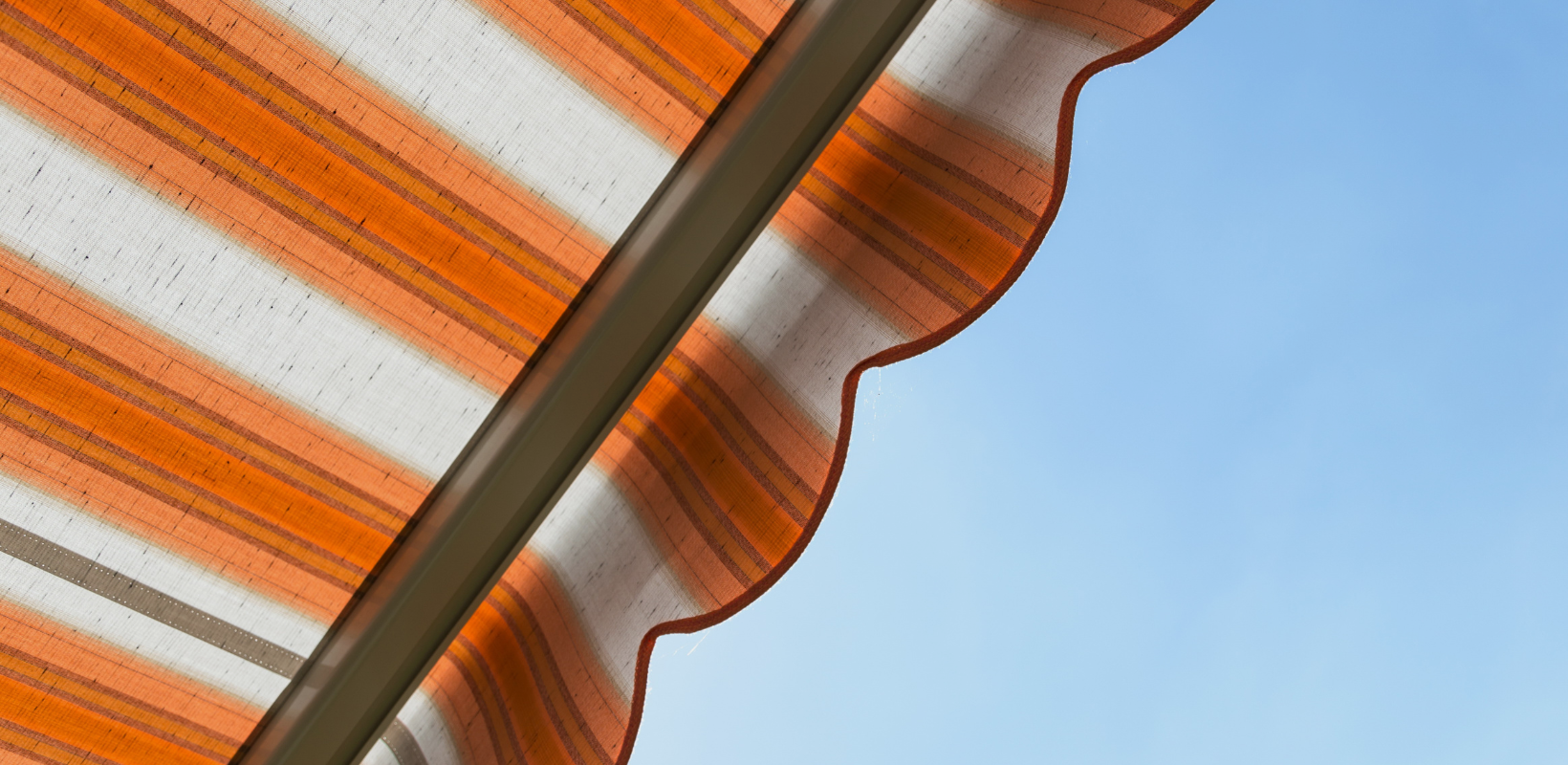 Create Cool Summer Spaces With Awnings By HomeKeepr header image.