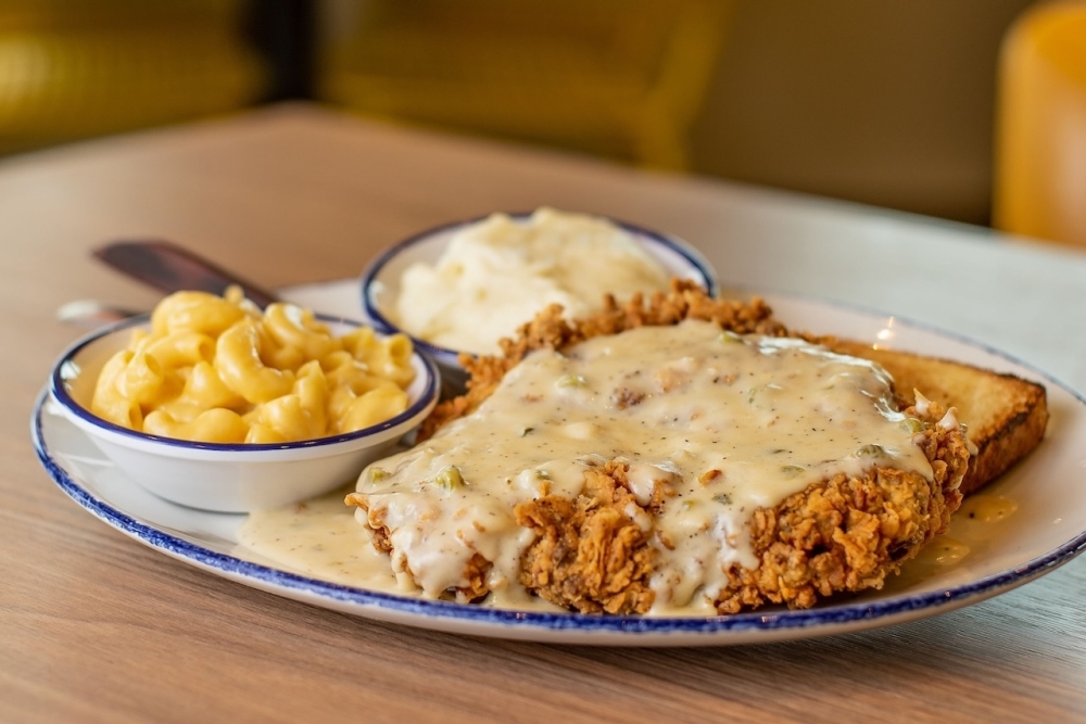 Mia’s Table coming to Market at Town Center in Sugar Land By Community Impact header image.