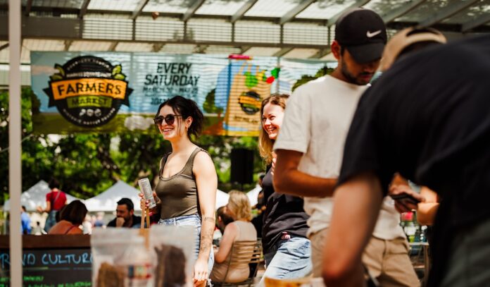 Feel fall vibes at the free Market Square Park Farmers Market Friendsgiving Block Party By 365thingsinhouston header image.