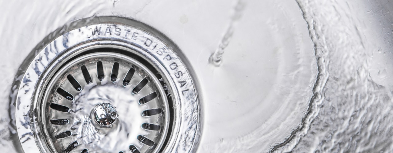 Better Garbage Disposal Care Tips by HomeKeepr header image.