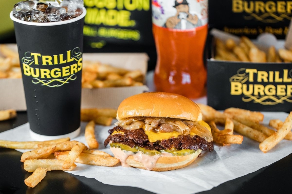 Bun B's Trill Burgers expands with new locations in Missouri City, Spring By Community Impact header image.