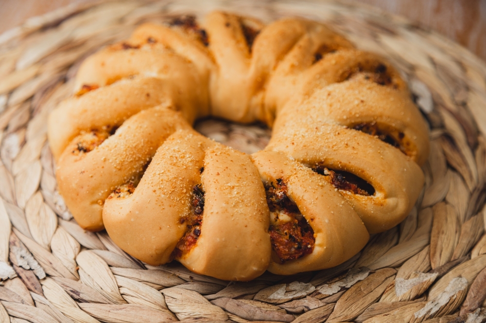 Aromas Bakery & Cafe now serving artisan bread, pastries in Humble By Community Impact header image.