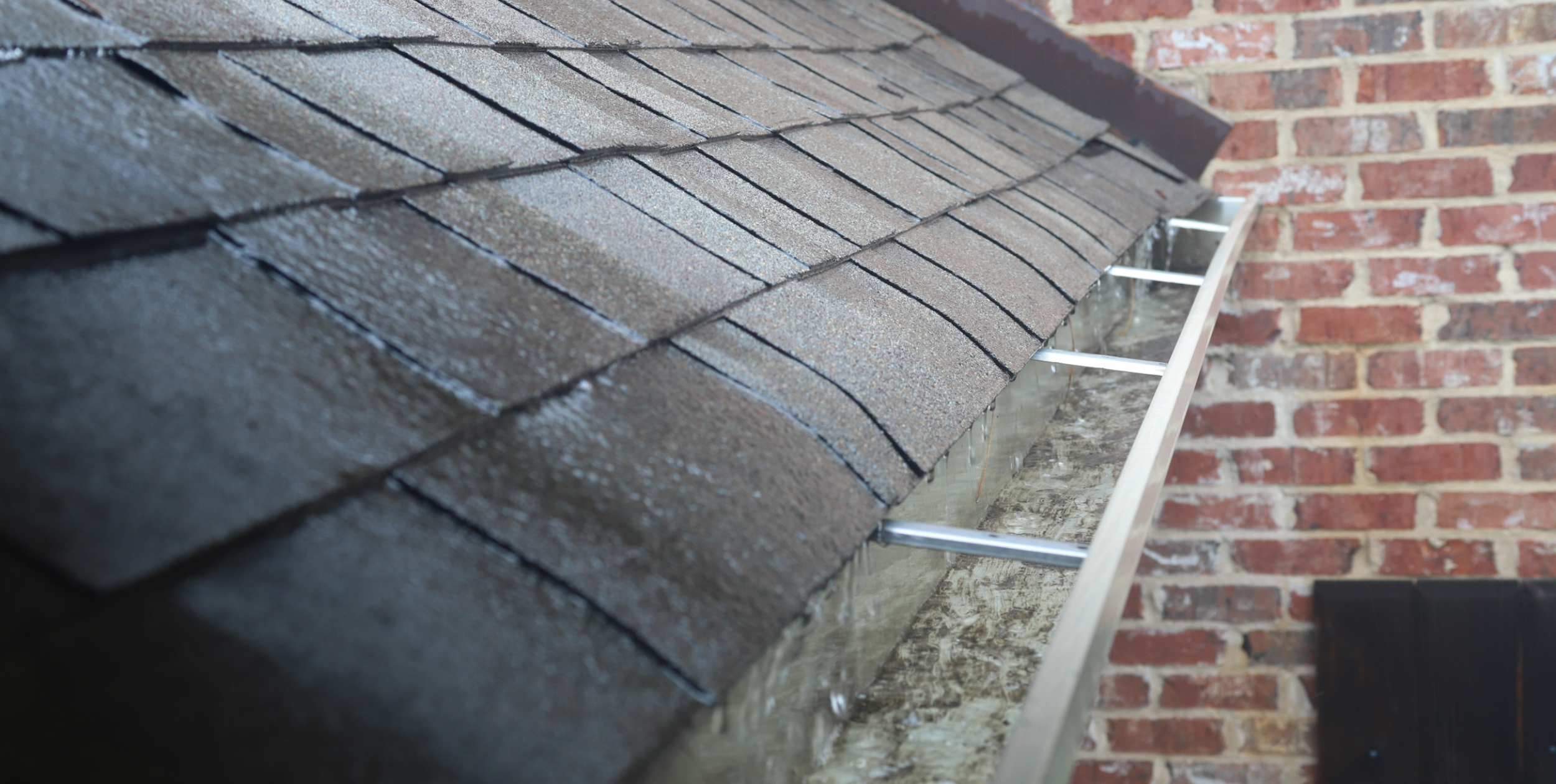 Rain, Rain Go Away–The Importance of Proper Water Drainage By HomeKeepr header image.