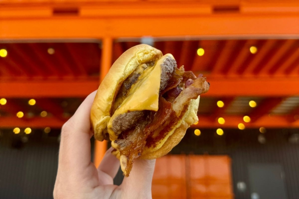 Smalls Sliders now open in Conroe By Community Impact header image.