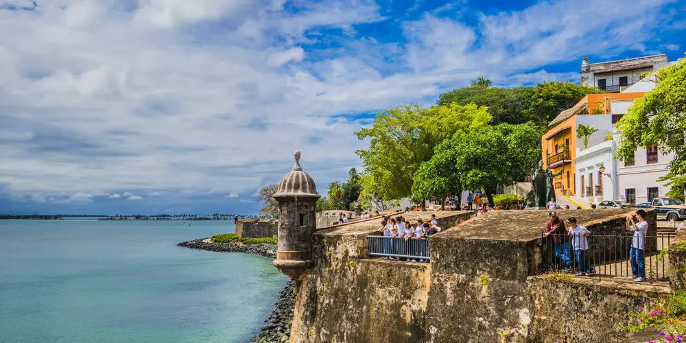 4 reasons why more people are choosing Puerto Rico as their new home By Business Insider header image.