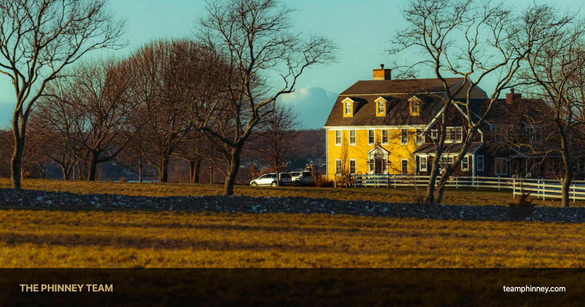 Charming colonial-style home on a quiet New England street representing homes for sale in Salem NH