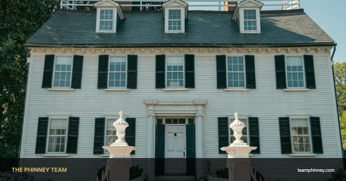 Charming colonial-style home with black shutters and white trim — homes for sale Derry NH 2026