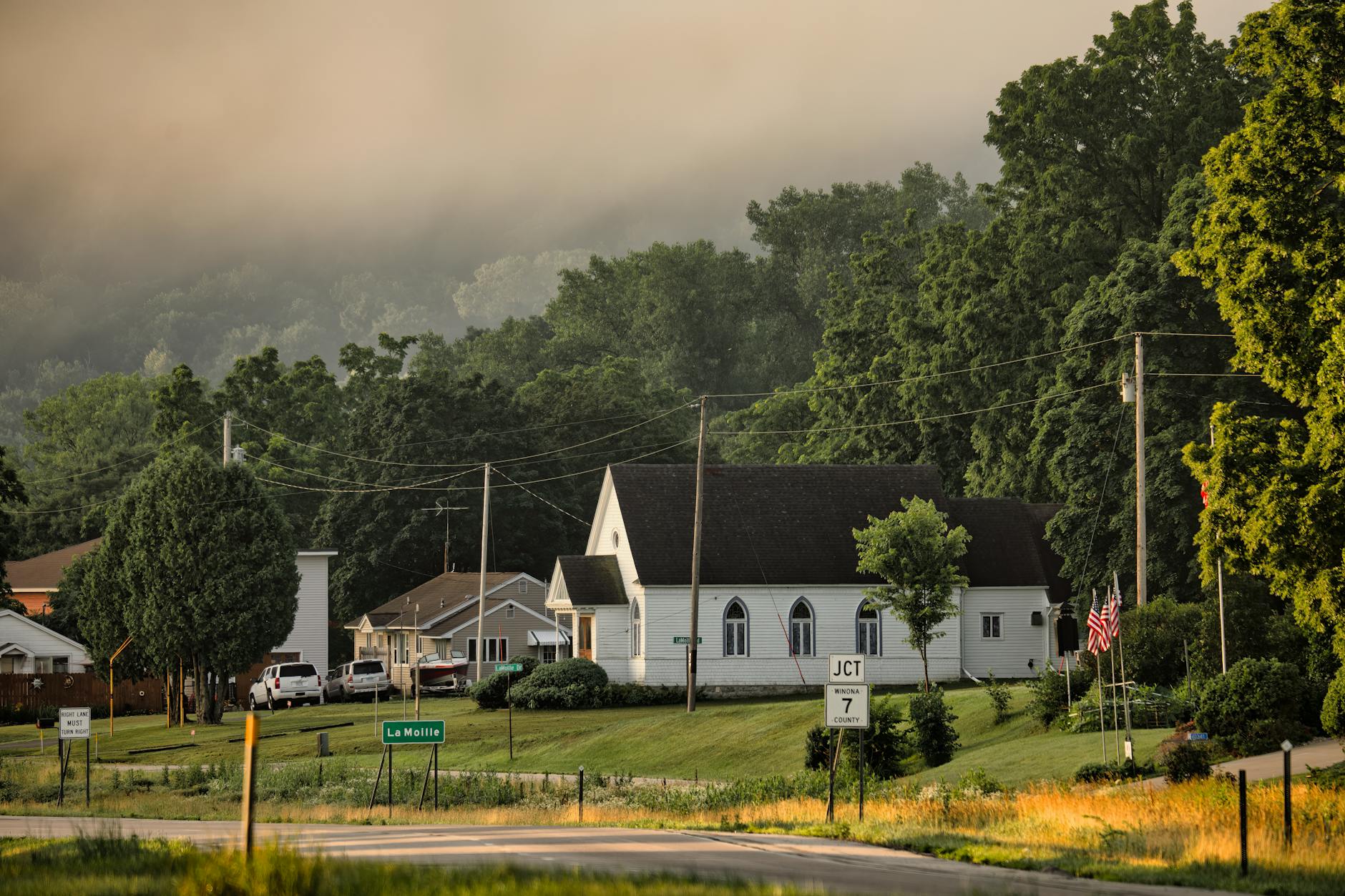 Summer on a New England town main street — best New Hampshire towns for young professionals