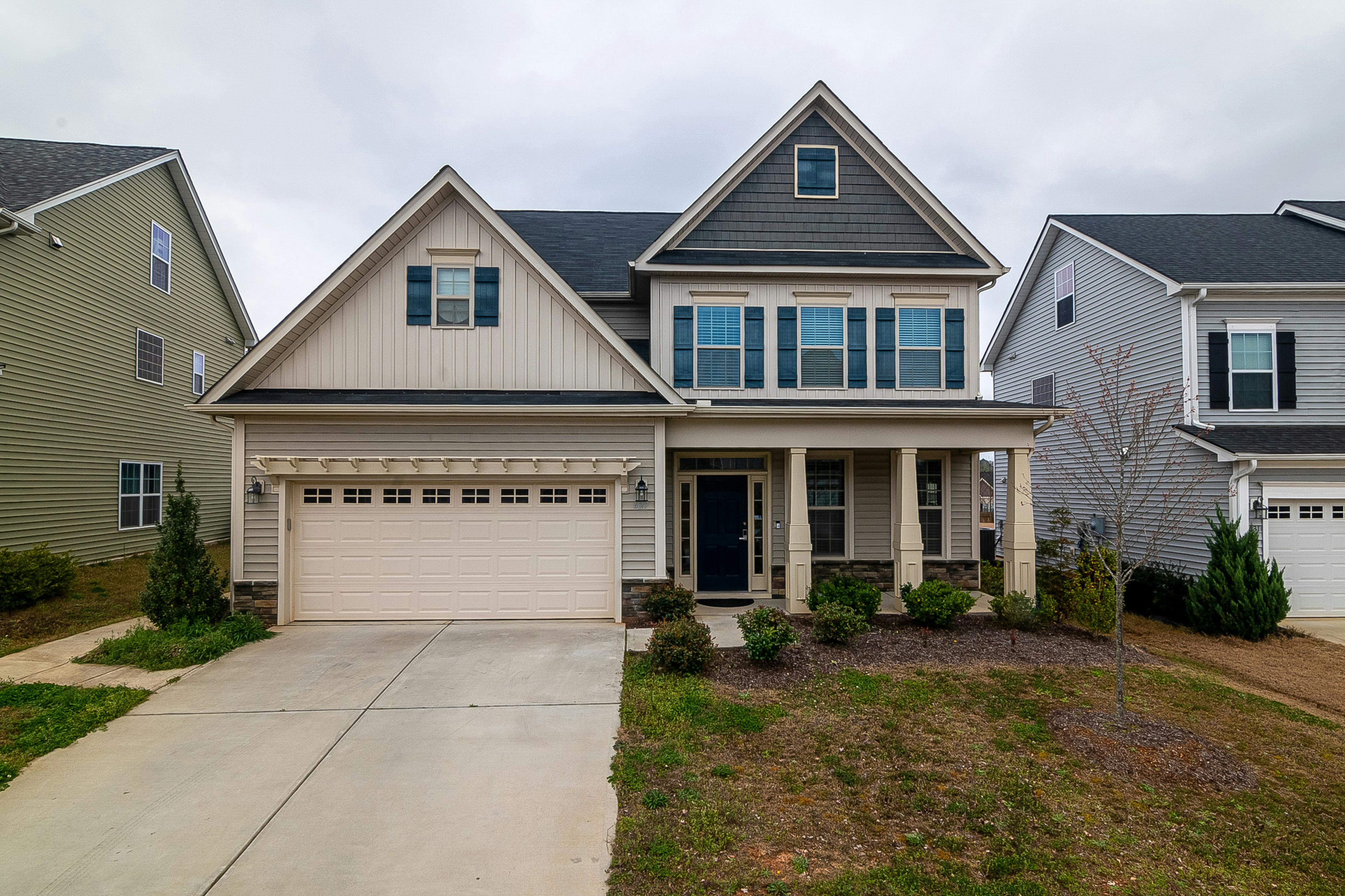 Modern two-story suburban home with attached garage — Hooksett NH real estate market 2026