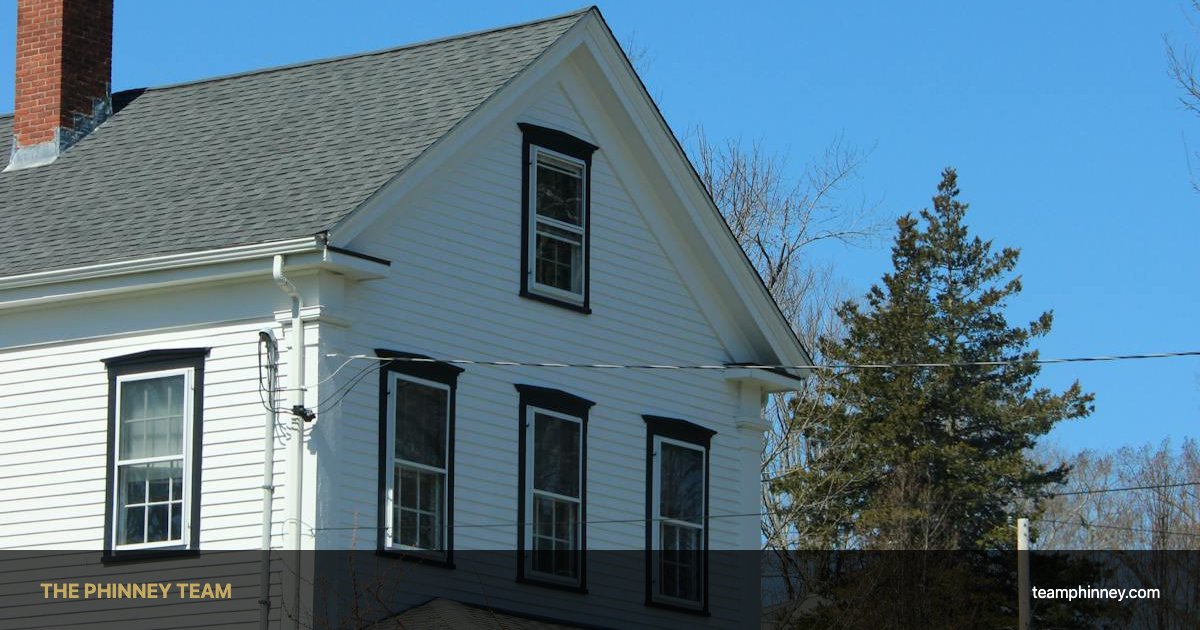 Homes for sale in Goffstown NH - classic New England colonial house on a tree-lined street