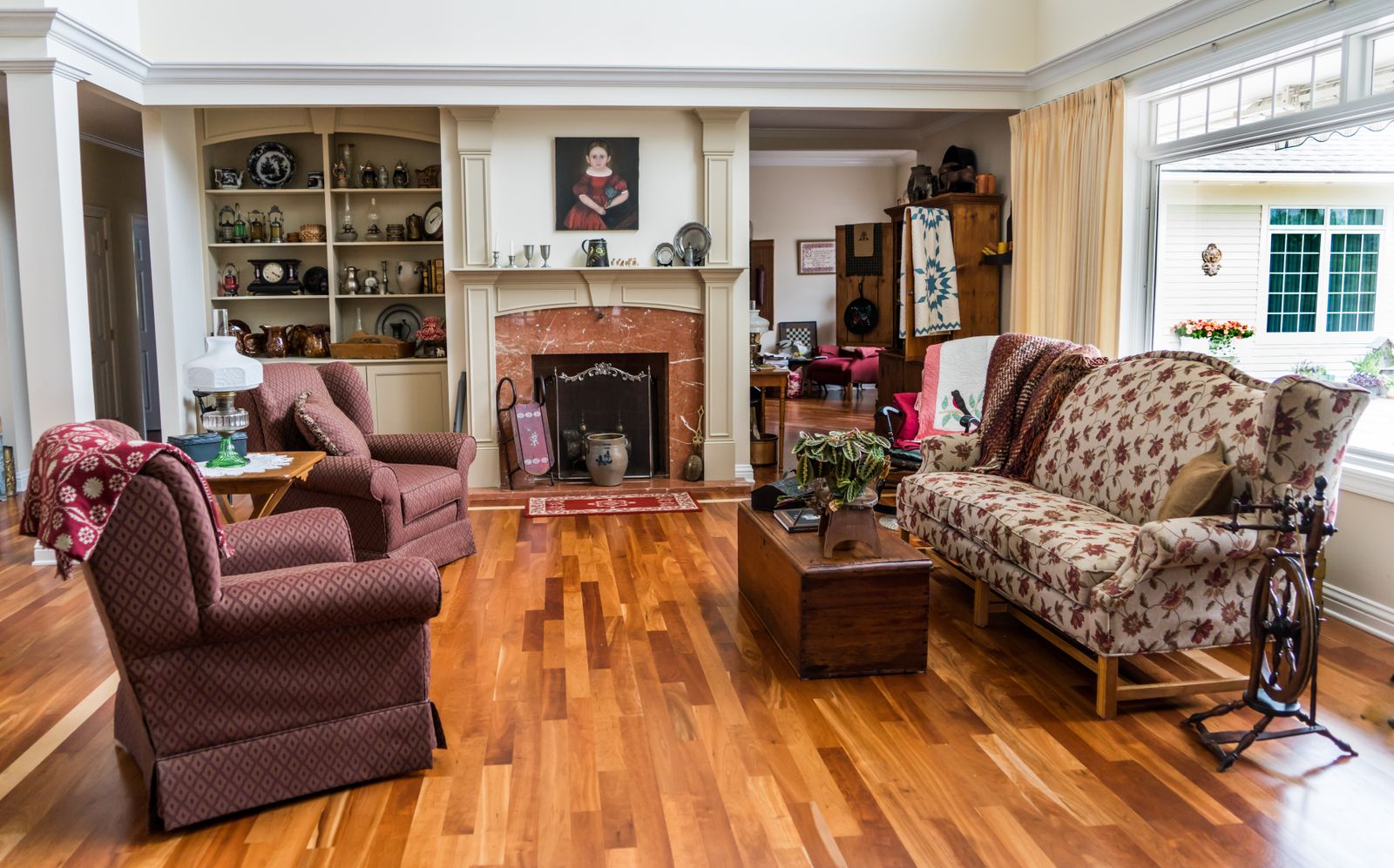 Furnished living room with sofa, armchairs and center table in a home listed for sale — New Hampshire home selling timeline