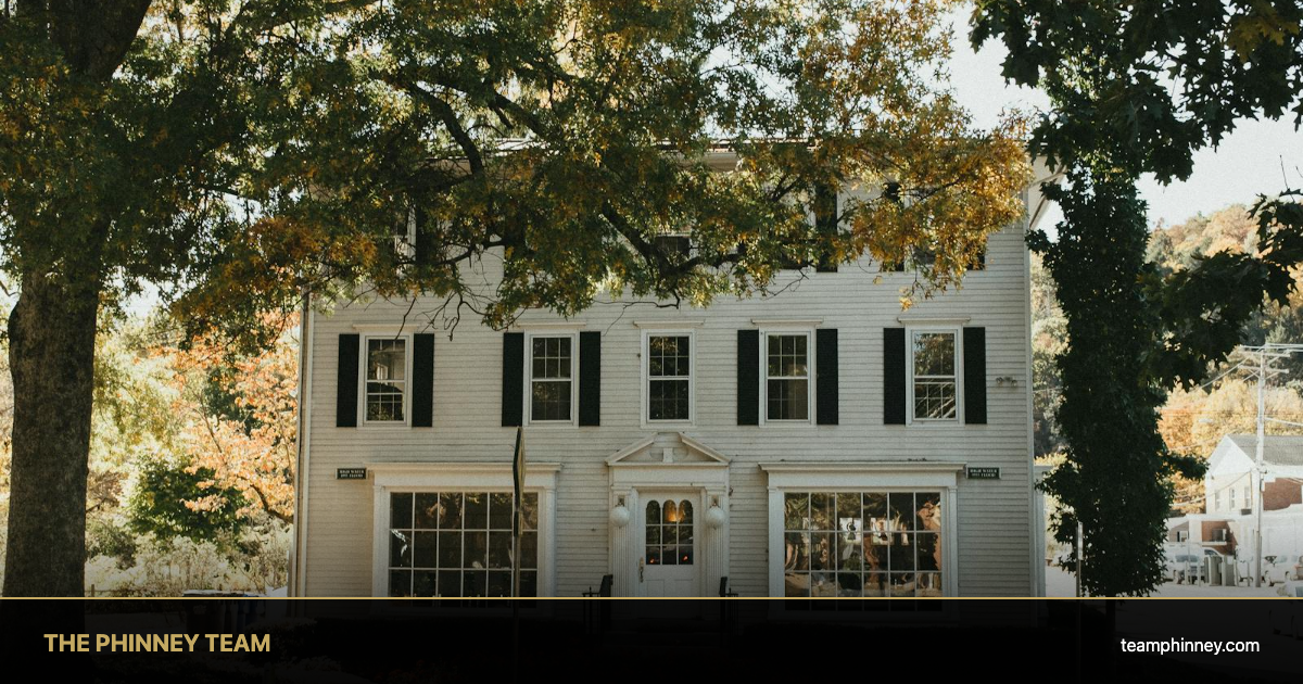 Colonial home with autumn foliage — homes for sale Bow NH