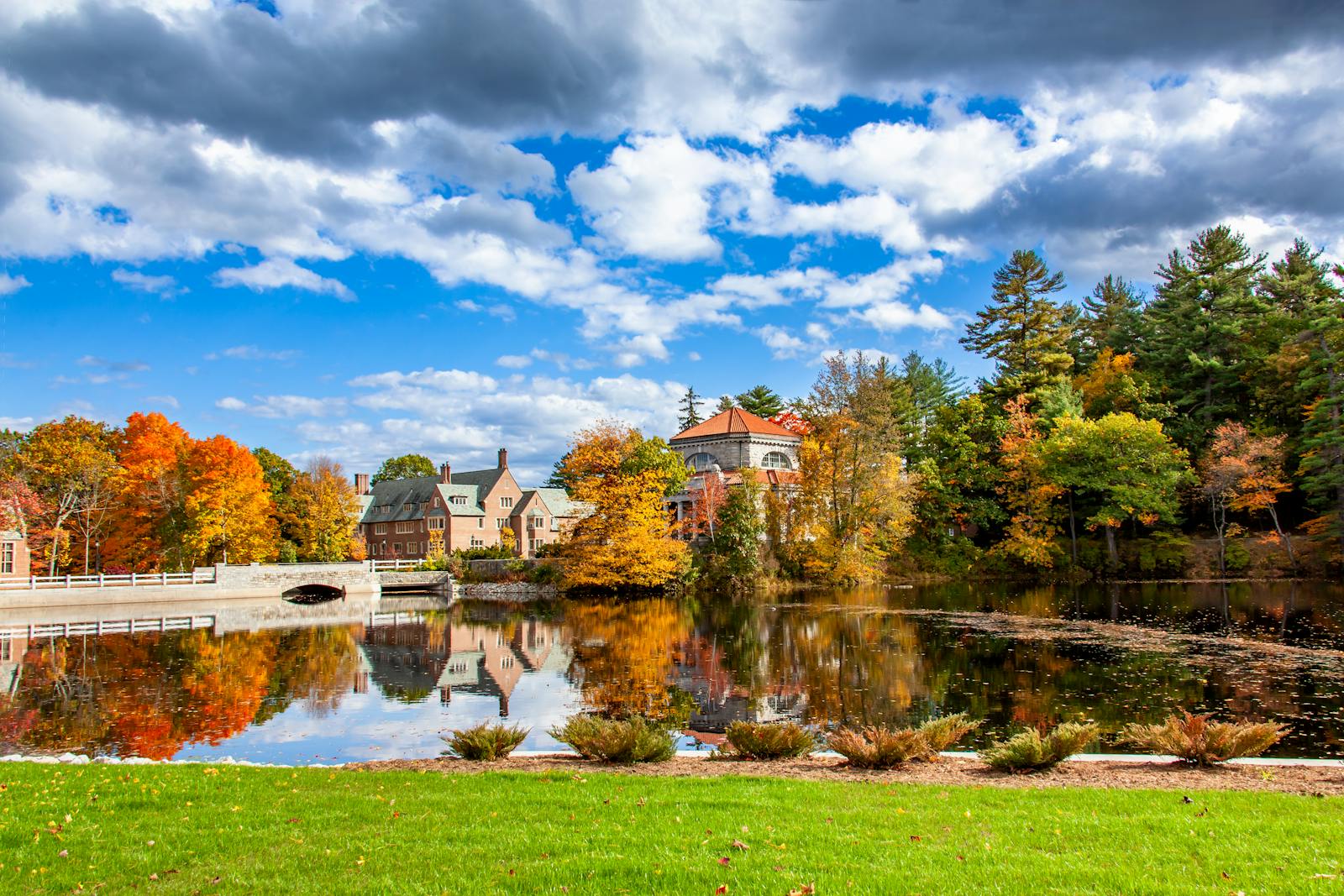 Autumn landscape with vibrant foliage and calm waters in Concord NH