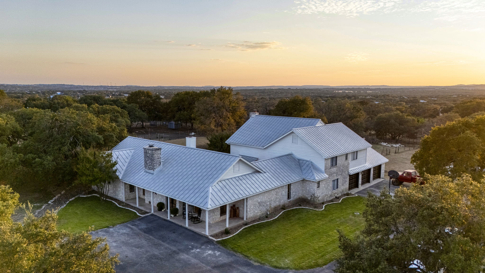 Luxury home in the Back 40 of Fair Oaks Ranch at sunset, recently sold for over $1M in the Boerne Texas Hill Country