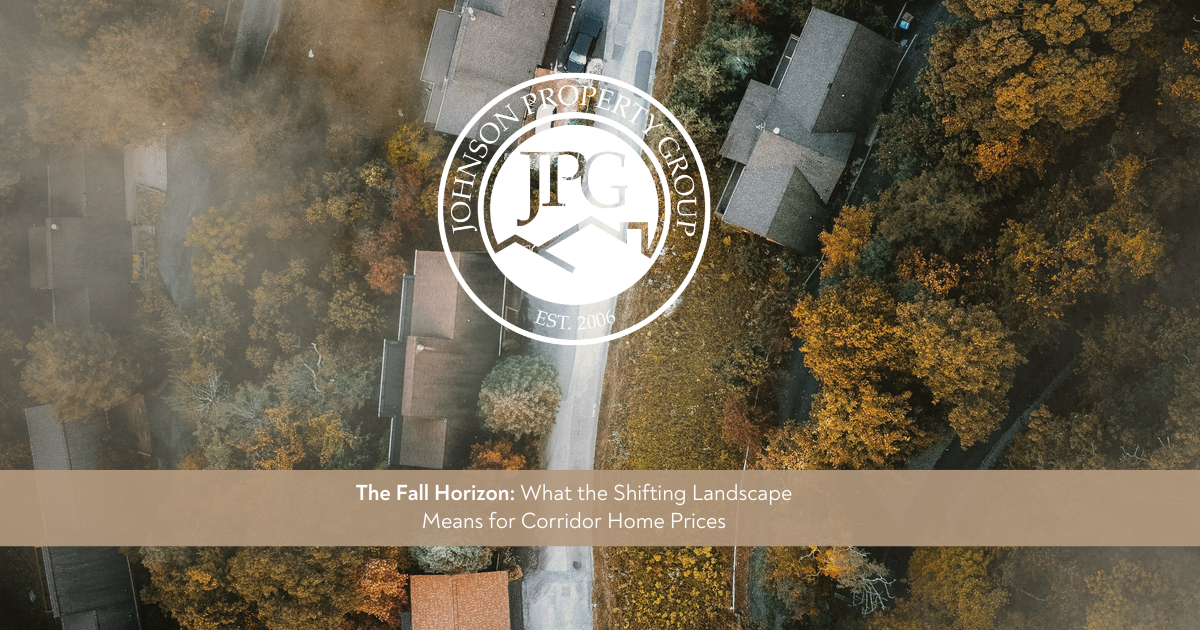 Johnson Property Group branded fall market update graphic showing a refined WNC neighborhood street with soft autumn light, mountain tones, and a polished real estate market report feel.