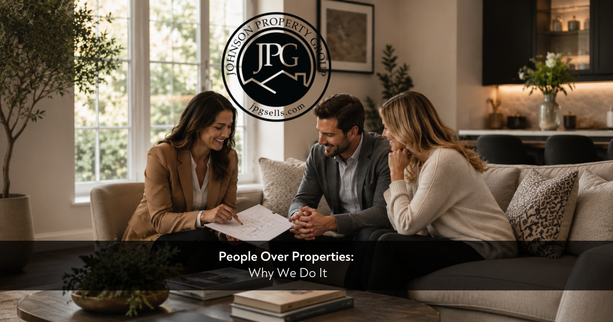 Johnson Property Group branded lifestyle image showing a warm client-focused real estate moment with people connecting in a welcoming home setting, representing service-first real estate.