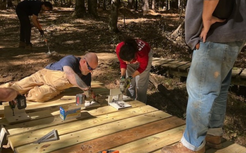 Dana helping to drill