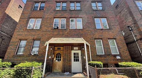 Unveiling Jersey City's Real Estate Gems with Reggie Bouzy and The Bouzy Group header image.