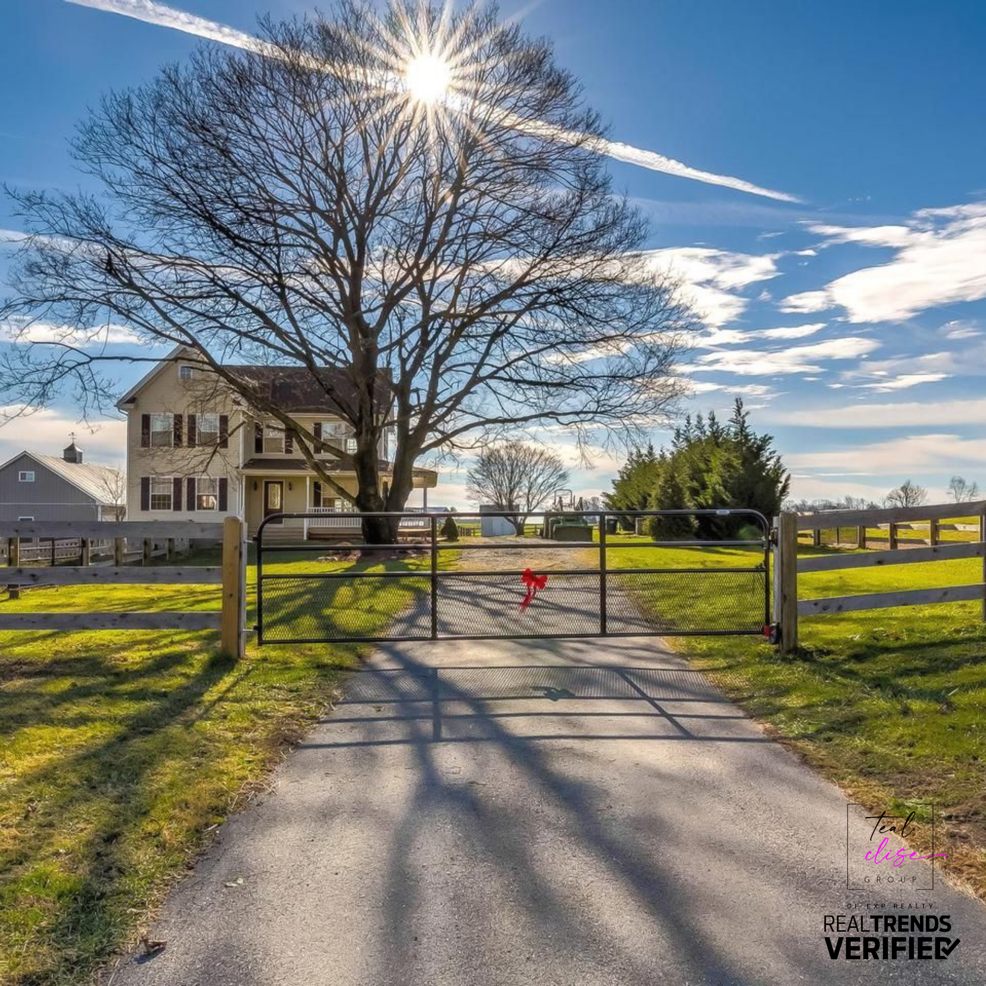 Gated country home with large tree, long driveway, and open farmland in Maryland — showcasing rural charm and peaceful living in a hidden gem neighborhood, perfect for buyers seeking space and serenity.
