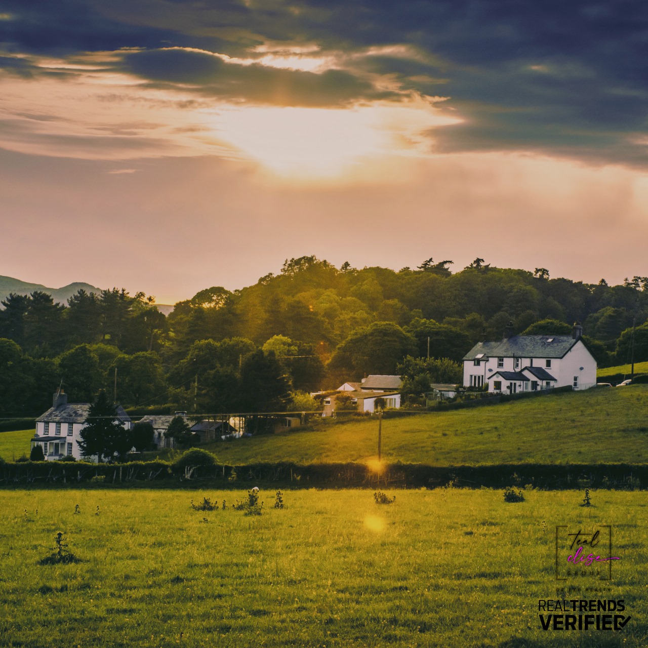 Scenic sunset over rolling farmland with white farmhouses and tree-lined hills in Maryland’s Eastern Shore, capturing the peaceful rural lifestyle of Cecil and Harford Counties.