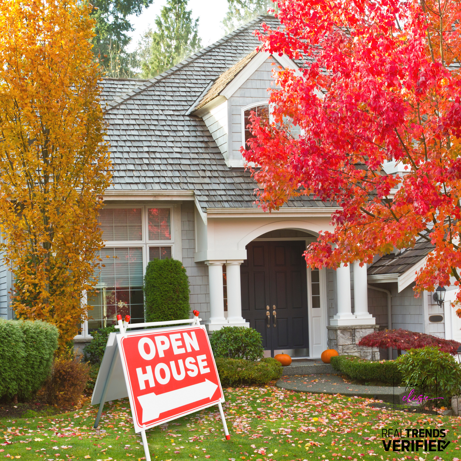 A welcoming Maryland home with bright fall foliage, pumpkins by the door, and a large red 