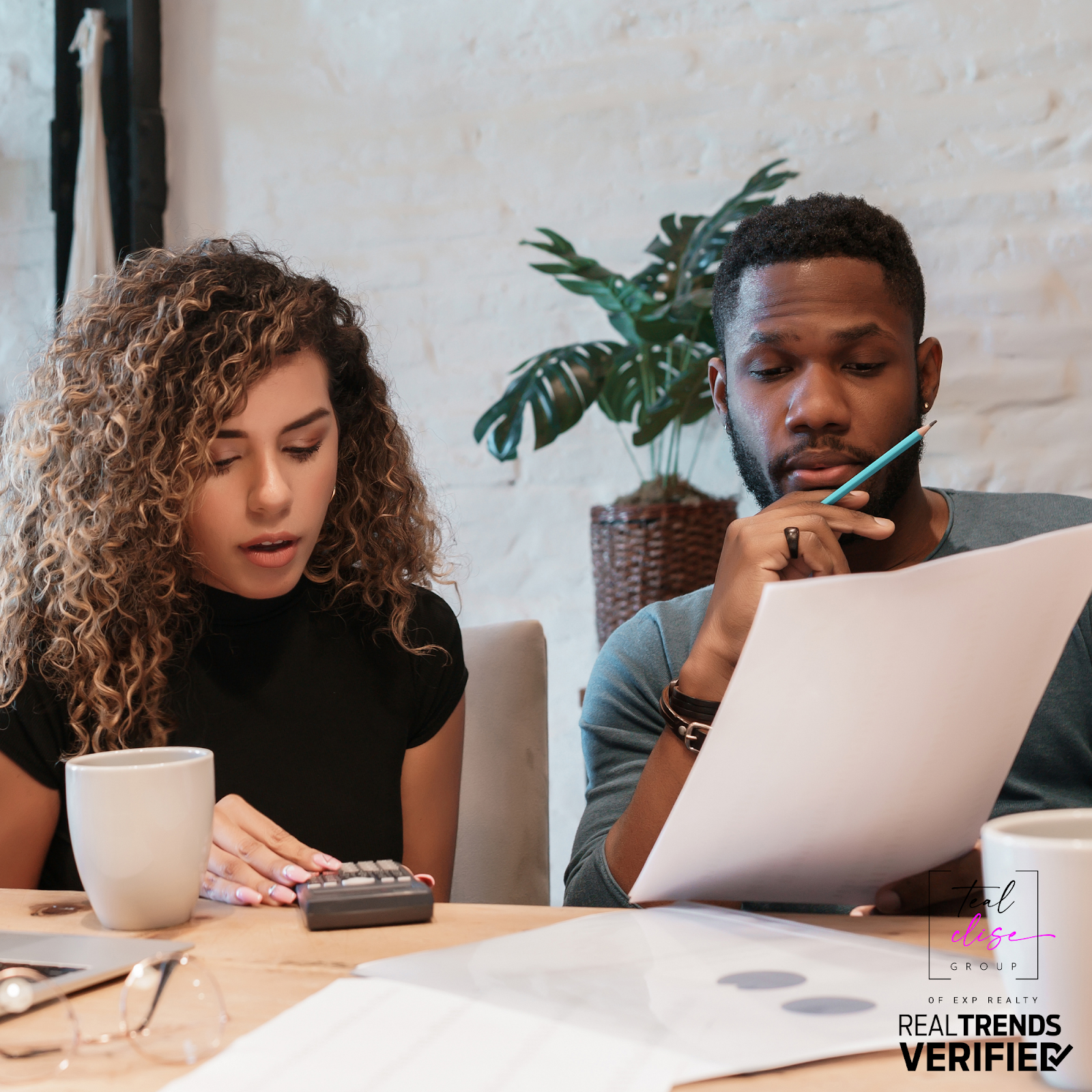 Maryland homebuyers reviewing finances and calculating how much house they can afford before purchasing a home.