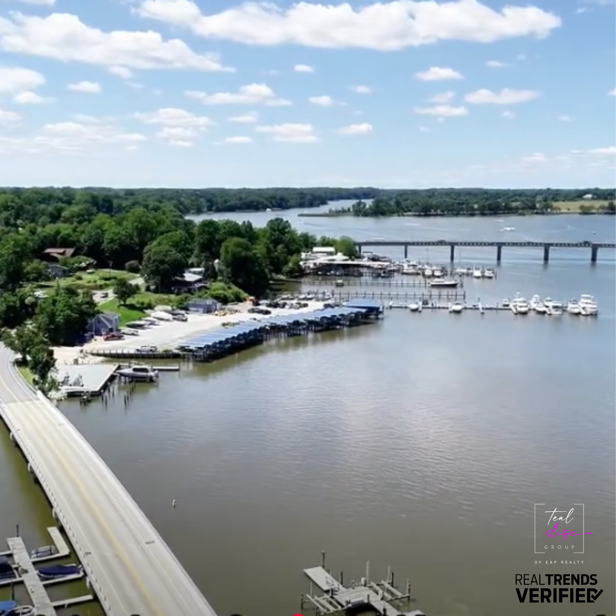 Aerial view of a marina and bridge in Cecil County, Maryland, showcasing waterfront living, open space, and scenic beauty—perfect for boating, outdoor activities, and a relaxed lifestyle.