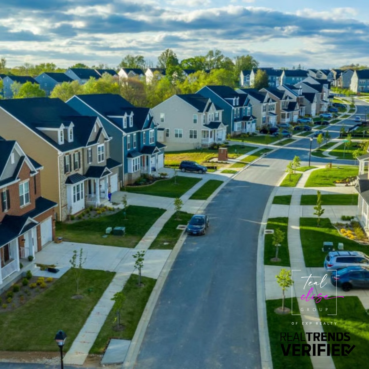 Aerial view of a picturesque Maryland neighborhood with charming homes and green spaces—showcasing why we love real estate here.